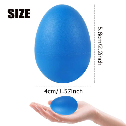 A vibrant blue egg-shaped plastic egg shakers percussion with a smooth textured surface for party favors supplies