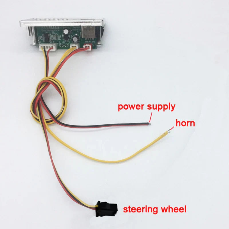 Silver-framed electronic control module with wires for 12v music player car startup sound in children’s electric car