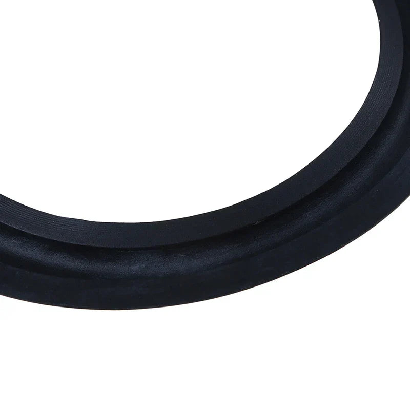 Black rubber woofer edge audio gasket with smooth textured surface and two concentric ridges for speaker surround foam repair