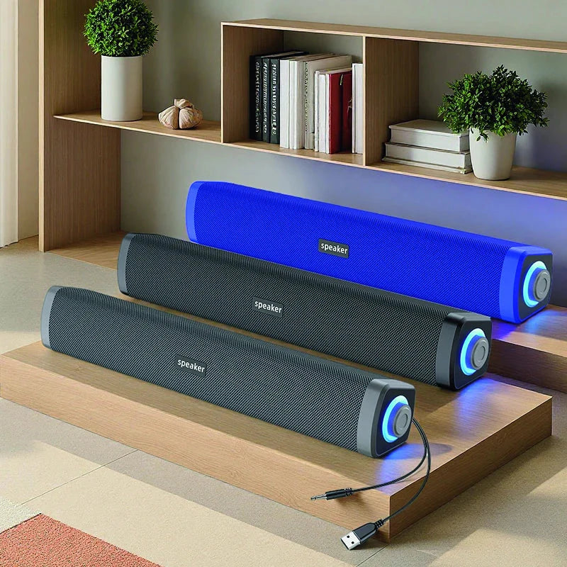 Three modern long strip fabric small speaker desktop models in blue and black with glowing led lights for notebook desktop wired use