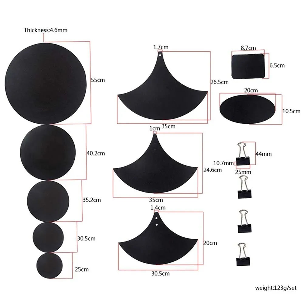 Set of black circular and fan-shaped drum mute pads made of sponge with three black binder clips for drumming practice