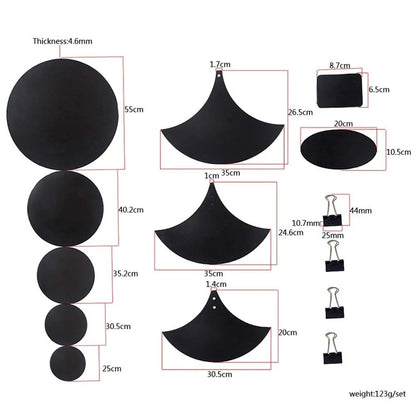 Set of black circular and fan-shaped drum mute pads made of sponge with three black binder clips for drumming practice