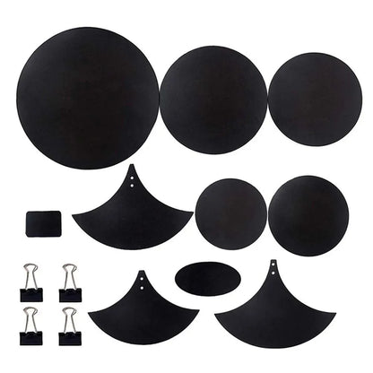 Set of black circular and crescent-shaped drum mute pads made of sponge with matching binder clips for drumming practice