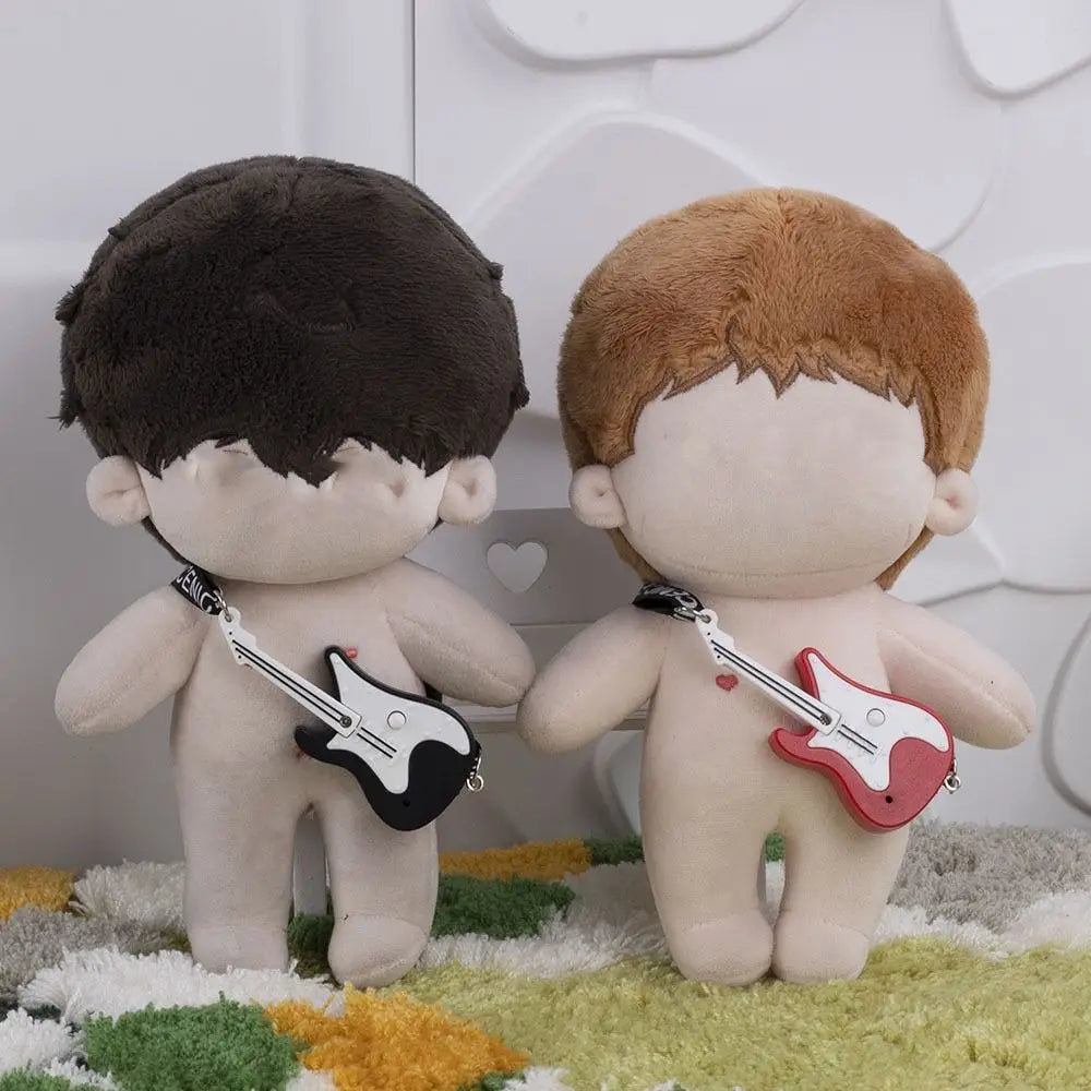 Two plush dolls with dark and light brown hair holding multicolor miniature electric guitars for 20cm doll musical scenes