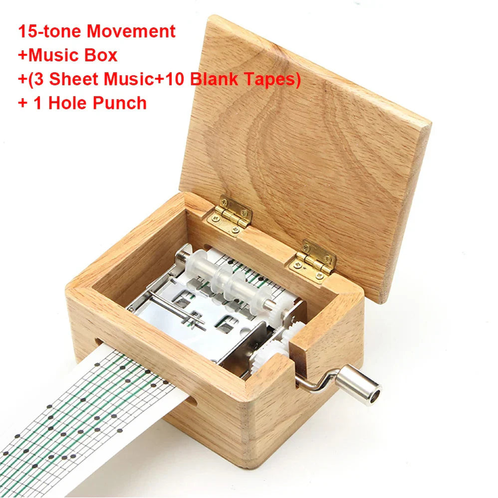 Light-colored wooden 15/30 tone hand-cranked music box with silver crank, paper tape puncher, and music paper composing movement creative diy