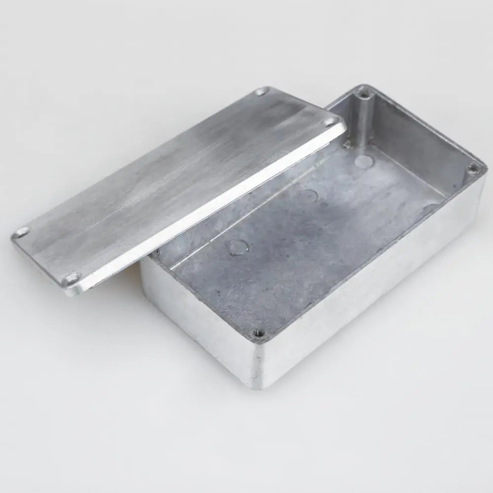 Silver-colored 1590b effects pedal enclosure with hinged lid screws aluminum guitar holder replacement durable case