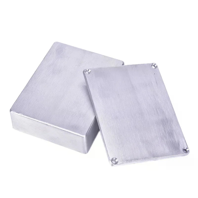 Silver 1590bb aluminum case effects pedal enclosure with brushed finish and corner screws for guitar pedals