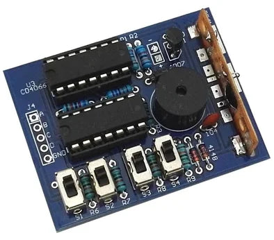 Blue circuit board music sound box with black integrated circuits and central speaker for electronic module diy soldering practice learning
