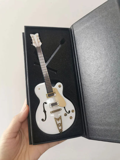 White and gold mini electric guitar wooden musical instruments model with support in black presentation box