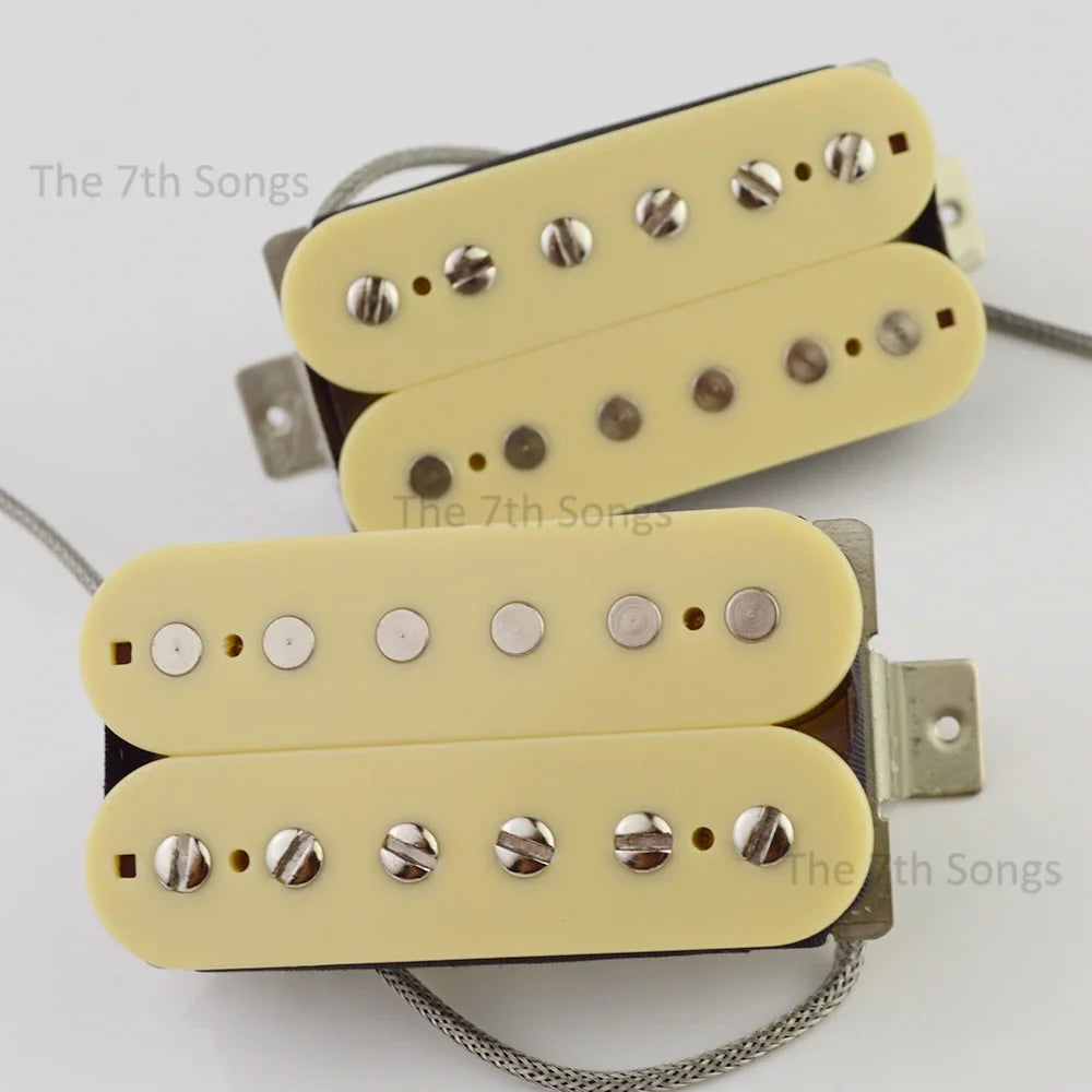 Cream-colored 1959 paf g alnico humbucker pickup with silver screws and braided leadd for vintage tone electric guitars