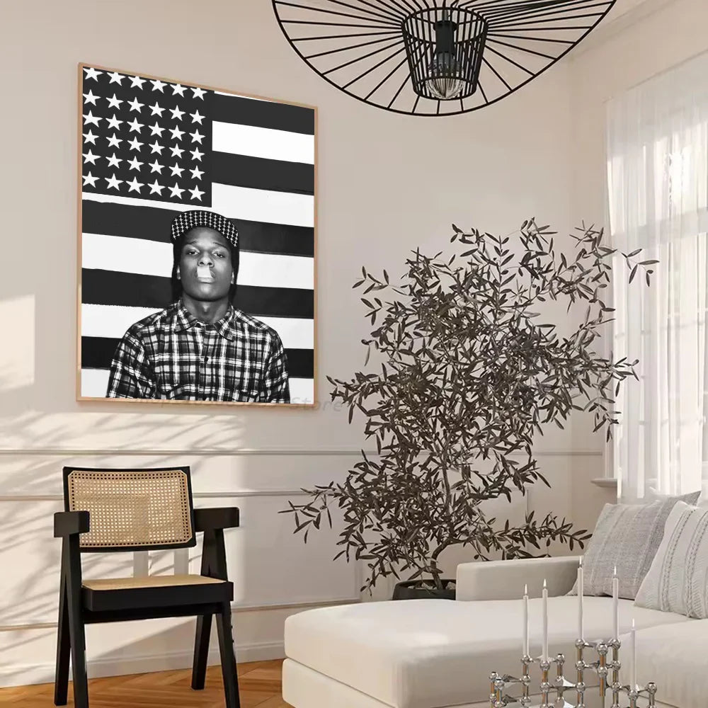 Black-and-white framed portrait poster of a man in checkered shirt and patterned cap with american flag background