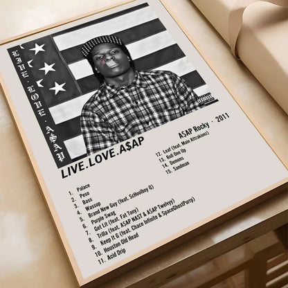 Black-and-white framed poster of asap rocky in plaid shirt with american flag backdrop displaying 2011 album tracklist