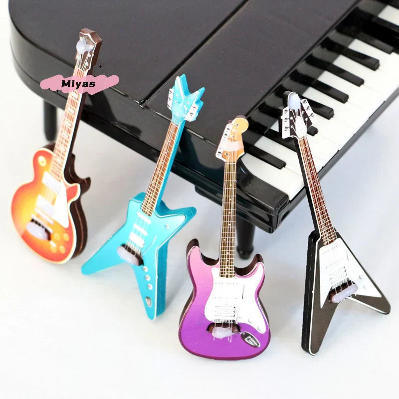 Four vibrant miniature electric guitars in sunburst orange blue purple black as 1pc classic guitar instrument model decorative accessory