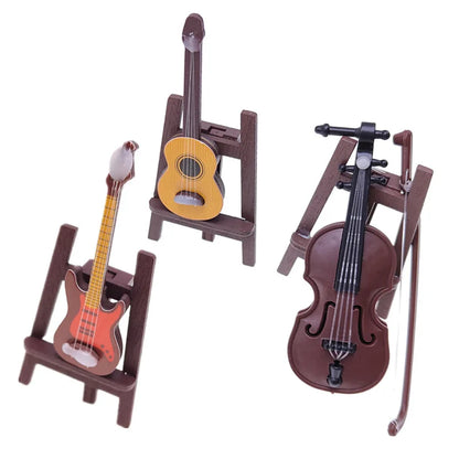 Set of three dollhouse mini christmas wooden musical instruments in red, yellow, and brown for miniature scene decor