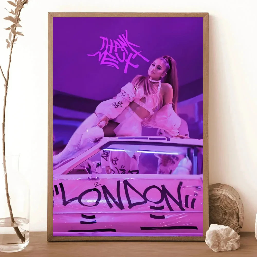 A 1pc famous singer ariana grande poster paper print featuring the singer in pink under purple lighting for print home living