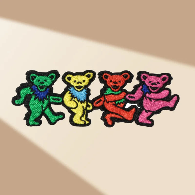 Set of four grateful dead dancing bears embroidered patches in green yellow red and pink for badge diy gift and apparel