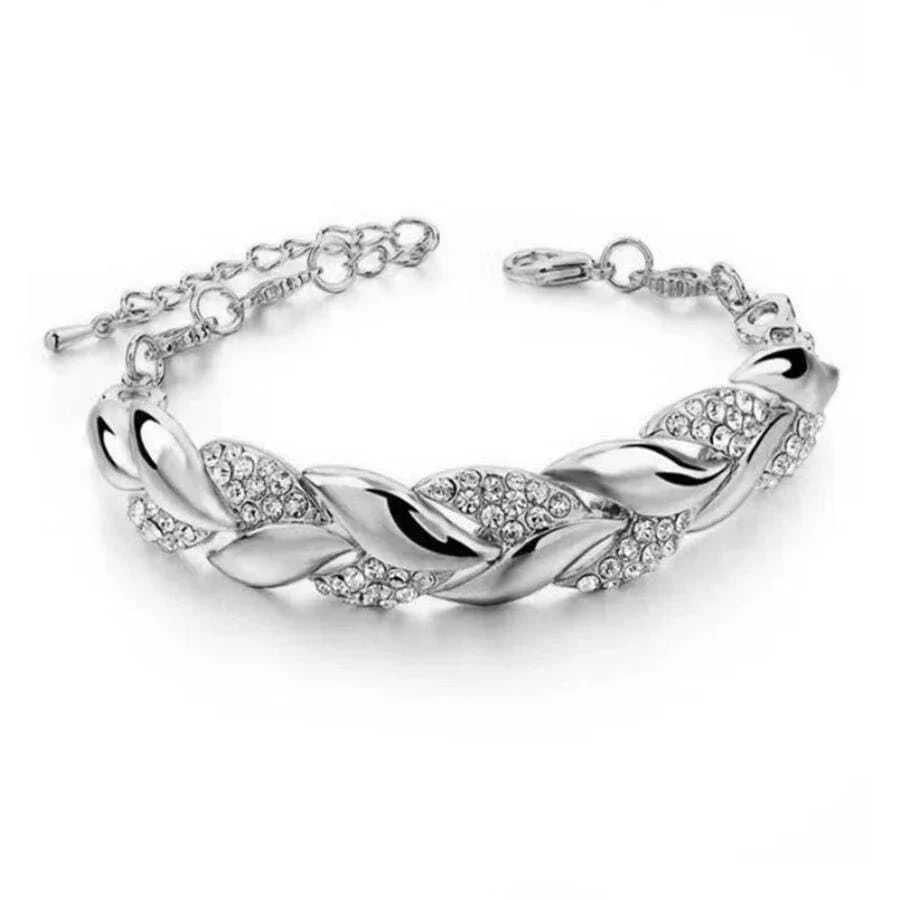Silver-toned hip hop leaf bracelet with twisted shining crystal stones and an elegant adjustable pendant chain