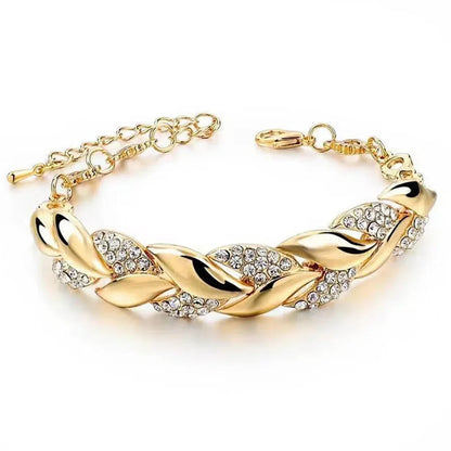 Gold-toned hip hop leaf pendant bracelet elegant with twisted shining crystal stones and adjustable chain for daily wear