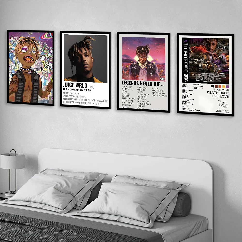 Four black framed juice wrld hip hop rapper music posters with colorful art on white backgrounds for retro room decor