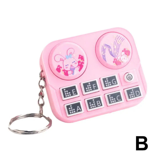 Pink plastic disc player keychain shaped like a music dj disc with cartoon rabbit and educational toy bag features