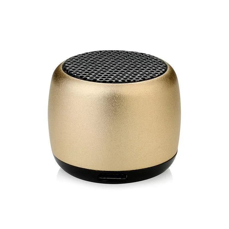 Gold-colored metal wireless loudspeaker bluetooth speaker portable with black mesh top for mobile and computer use