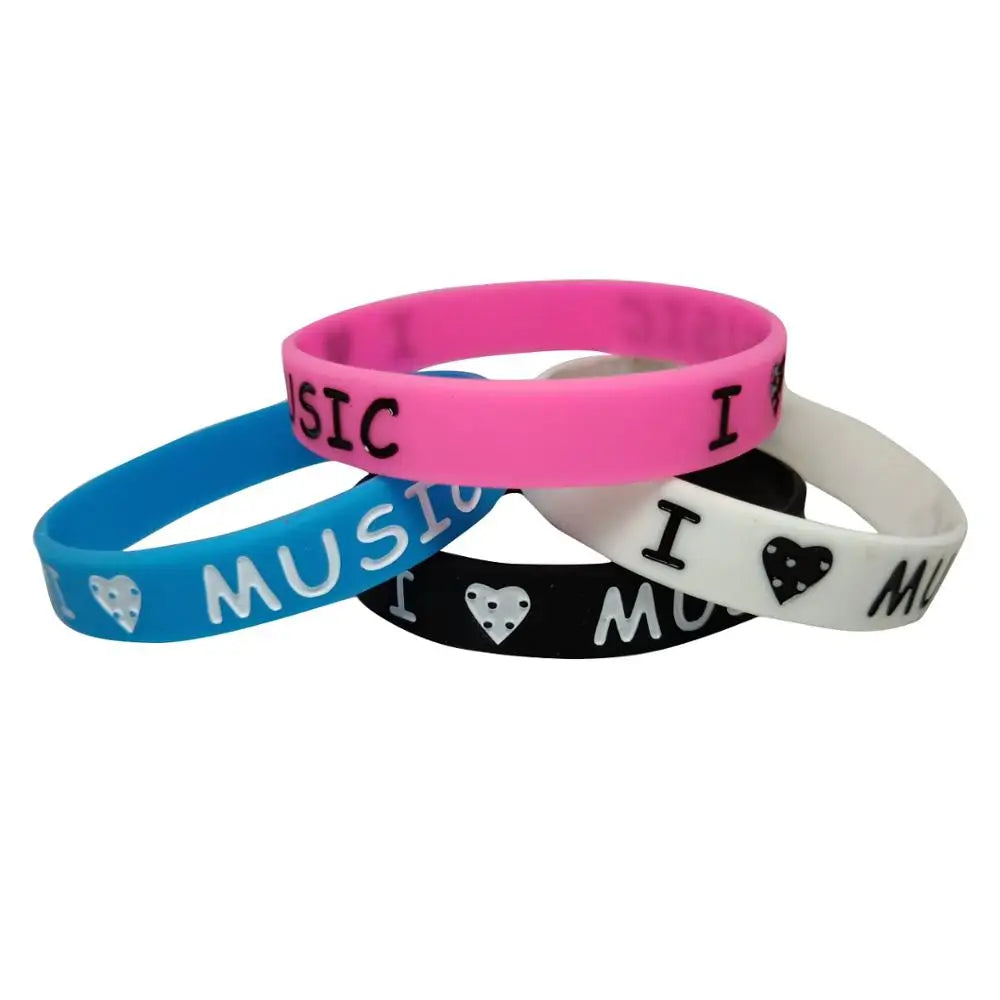 A set of colorful love music silicone wristbands with ink filled i heart music text for fans silicone rubber gift