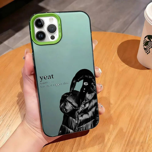 Back side of a sleek translucent green 1pc opium yeat phone case laser with black and white yeat graphic and color silver shell