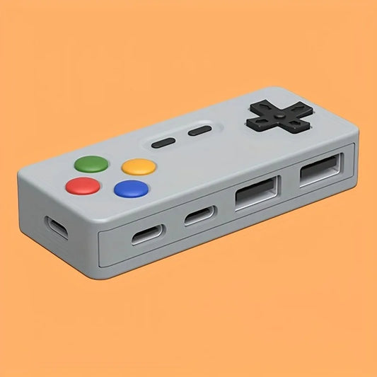 Gray plastic portable creative hub usb expander with 4 ports designed like classic game controller for type beat music devices