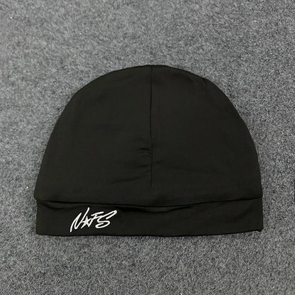 Black knit embroidery pullover hat with white letter embroidery pullover logo on folded brim for trendy casual wear