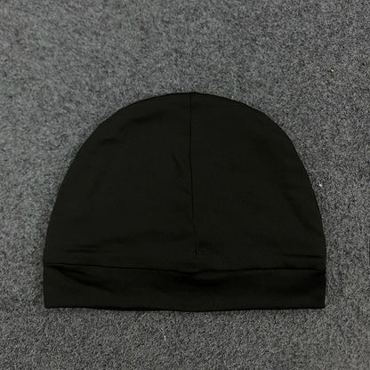 Black knit pullover hat with ribbed cuff seamless construction and letter embroidery pullover for trendy streetwear