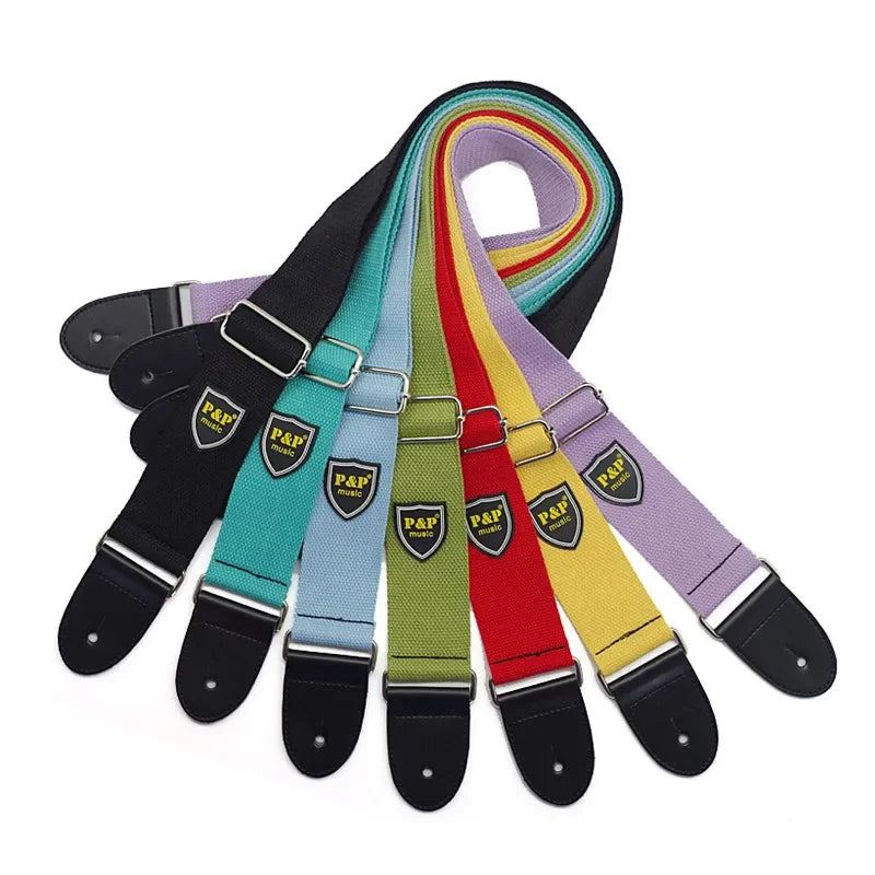 A colorful assortment of adjustable width 5cm acoustic bass electric guitar strap parts with shield logo patches and metal hardware