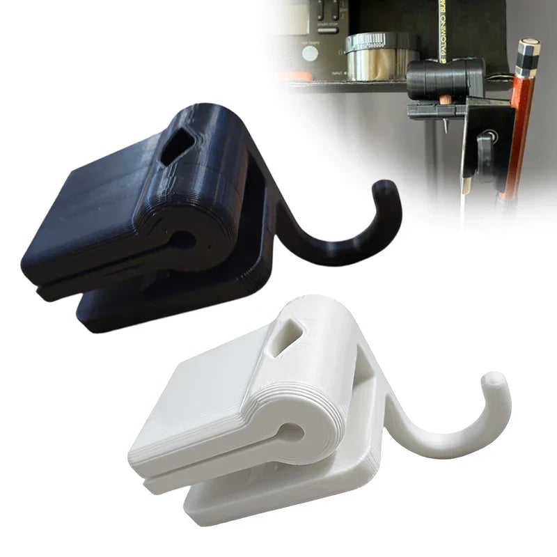 Black and white plastic folding bow hook organizer with curved hanging loop for violin viola cello players
