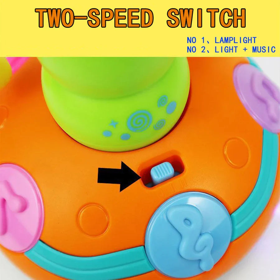 Bright orange and green children’s electric caterpillar saxophone toy with two-speed switch for light and music features