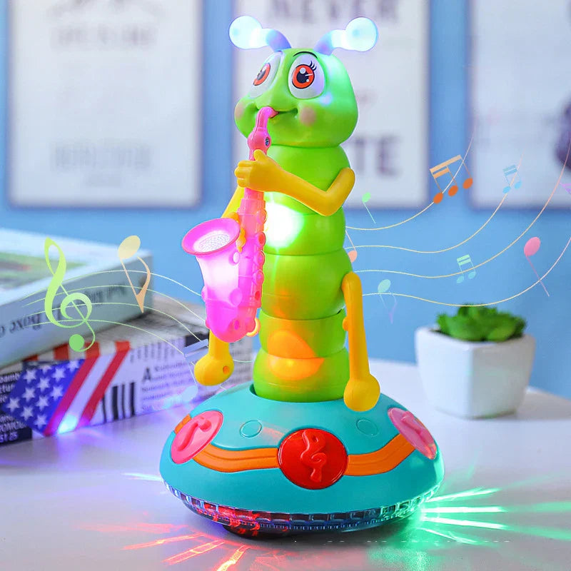 Green children’s electric caterpillar saxophone toy with glowing blue antennae playing pink saxophone on teal base