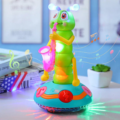Green children’s electric caterpillar saxophone toy with glowing blue antennae playing pink saxophone on teal base