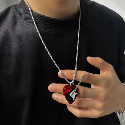 A silver stainless steel chain necklace with a red and black guitar pick pendent and white electric guitar charm unisex collier accessories