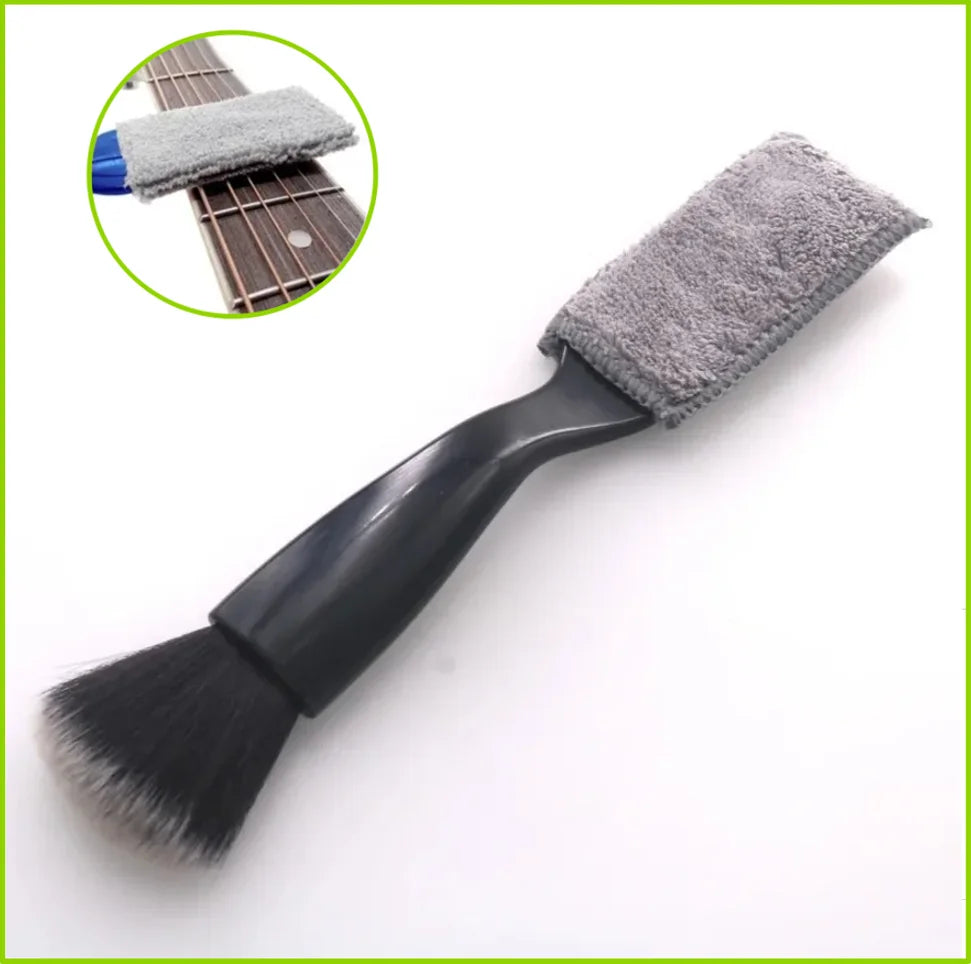 Gray microfiber guitar cleaning brush with black handle and soft bristles for fretboard musical instrument care tool
