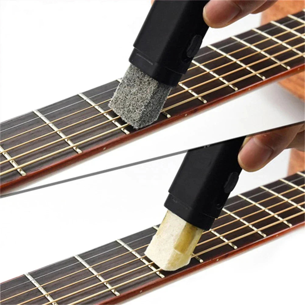 Black-handled guitar care brush with gray abrasive sponge and beige polishing pad for string fingerboard cleaning and dust removal