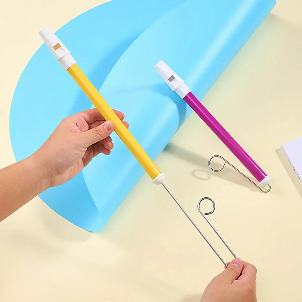Yellow and white plastic sliding whistle toy with metal hook attachment for classic music fun and fun gifts piccolo