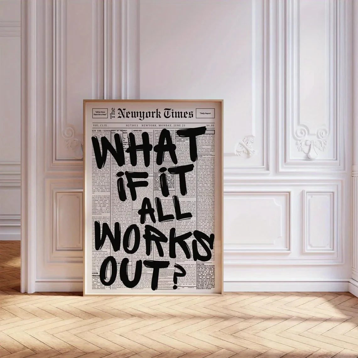 A framed black and white newspaper art print with bold handwritten text and a white edge modern poster design