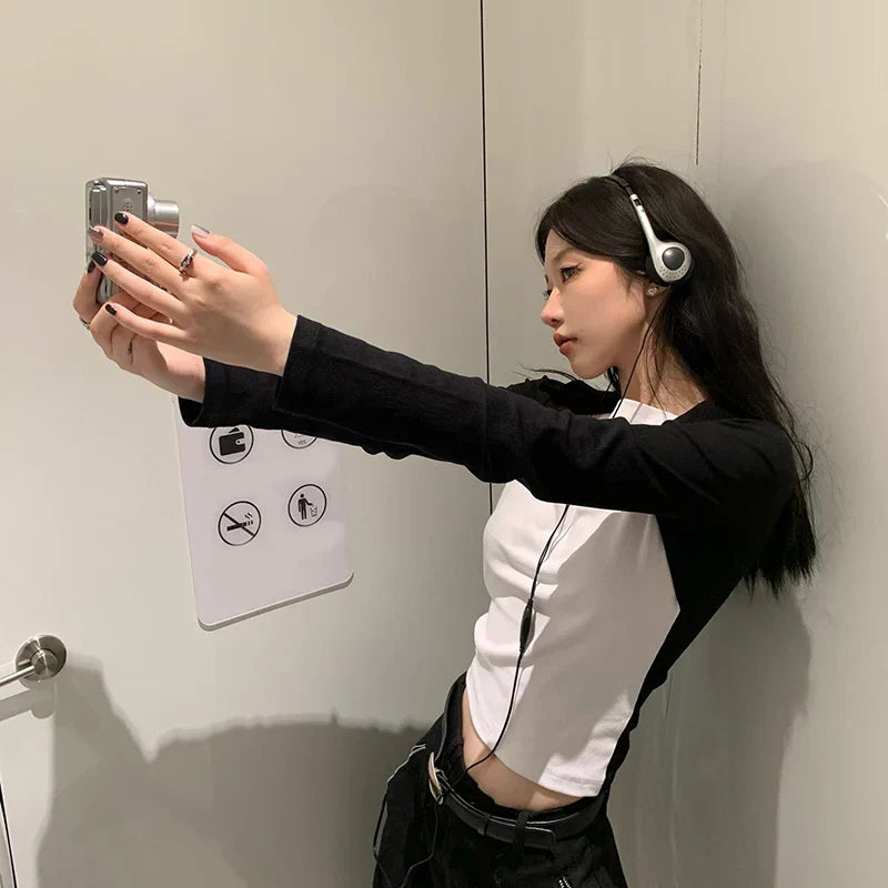 Silver over-ear wired small headphones with white earcups and black headband for retro classic headset music mp3 walkman use