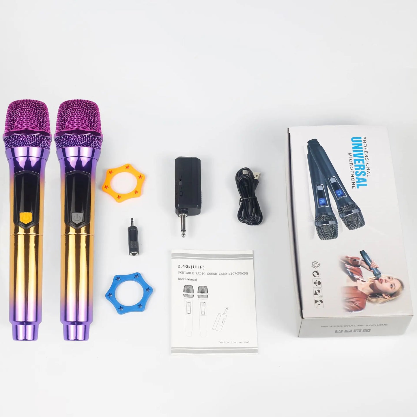 Two vibrant gradient purple and gold wireless handheld microphones with textured mesh grilles for karaoke use