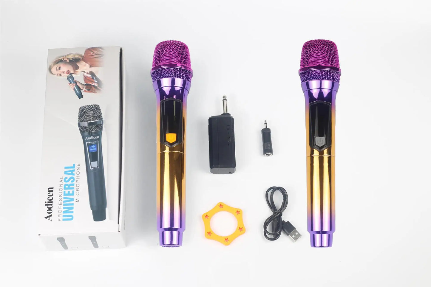 Two vibrant gradient purple and gold wireless handheld microphones with mesh grilles for karaoke beat music store use