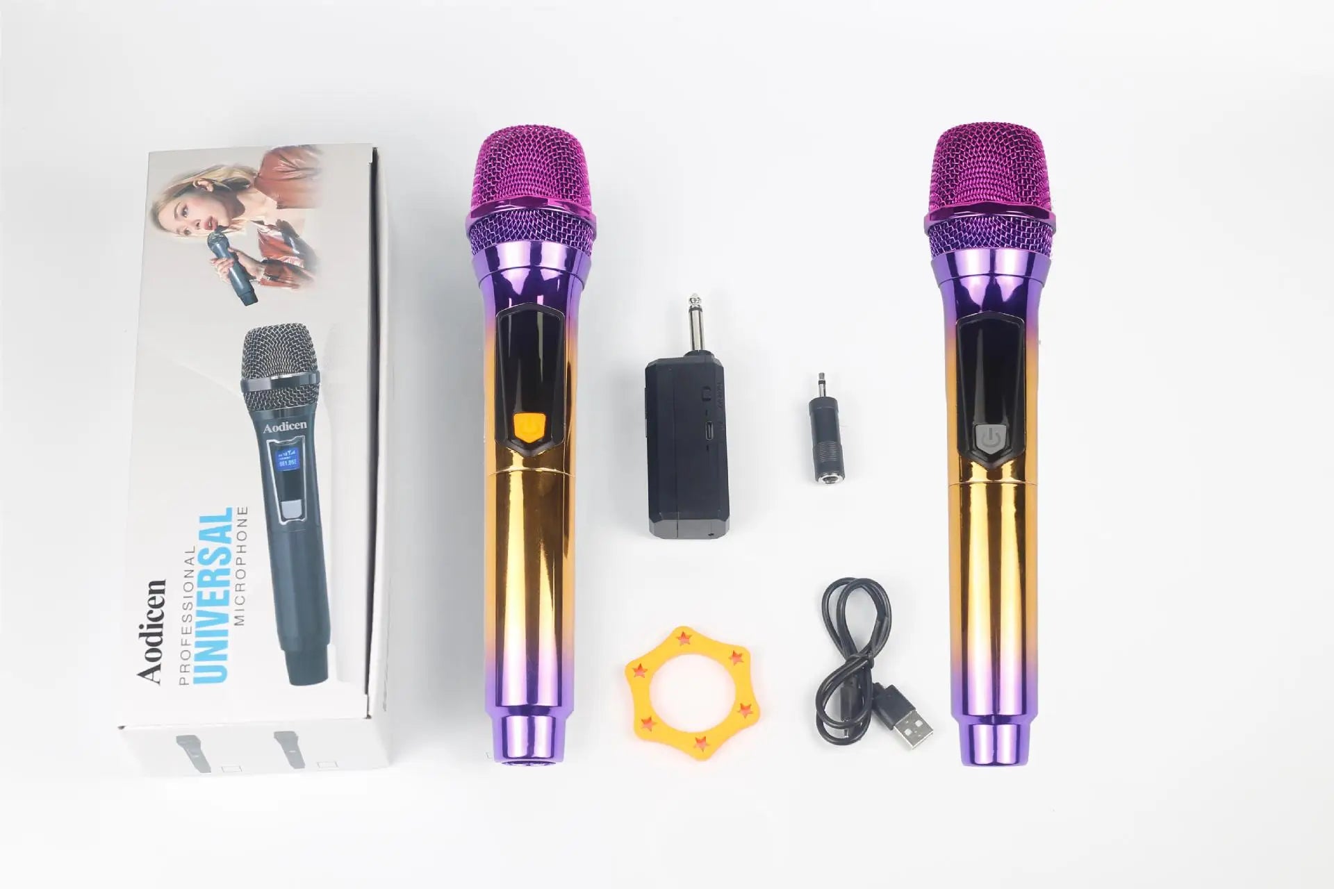 Two vibrant gradient purple and gold wireless handheld microphones with mesh grilles for karaoke beat music store use