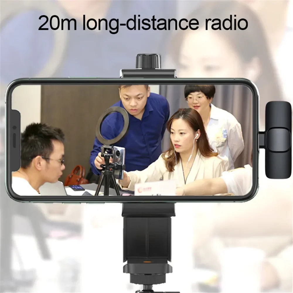 Black smartphone mount with adjustable clamp for securing devices compatible with wireless lavalier microphone iphone android live broadcast gaming