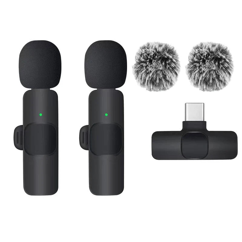 Black wireless lavalier microphone with high density windproof furry covers and usb-c adapter for portable recording