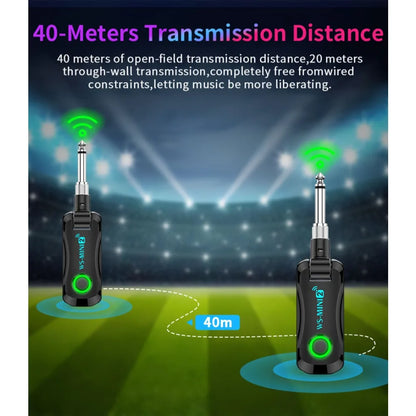 Black ws-mini2 2.4ghz mini wireless guitar transmitter with green glowing button and silver input jack for guitar bass electric instruments