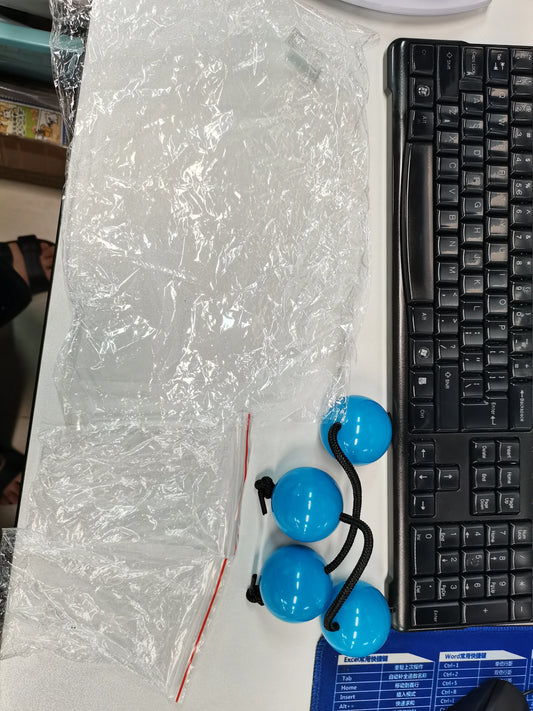 Bright blue glossy spherical beads connected by black braided cord in 2 pcs african rhythms rhythms aslatua shakers rhythm sand ball