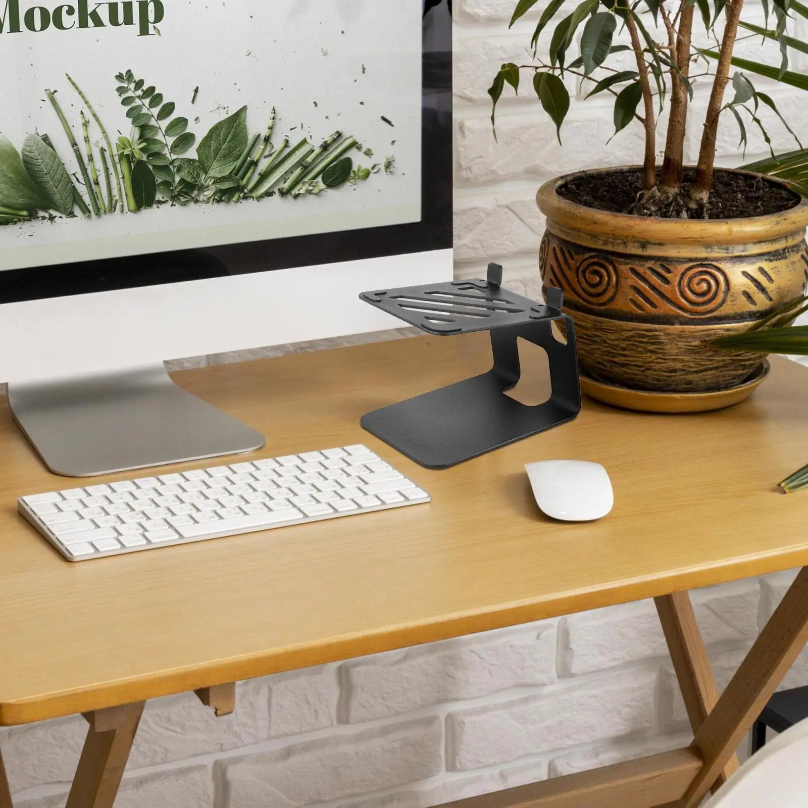 Black metal speaker desktop stand with minimalist slotted top surface steel stand home office accessory