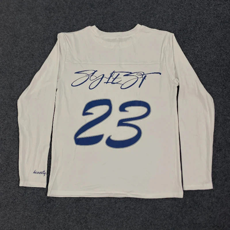 Back of a white long-sleeved shirt with navy cursive signature and bold outlined 23 in 2000s simple fashion harajuku streetwear hip letter printing round style